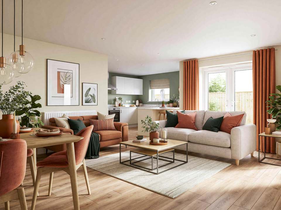 Light oak-effect laminate flooring in an open-plan living and dining room